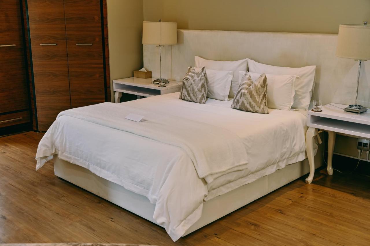 Tredenham Boutique Hotel Bloemfontein Exterior photo A bed