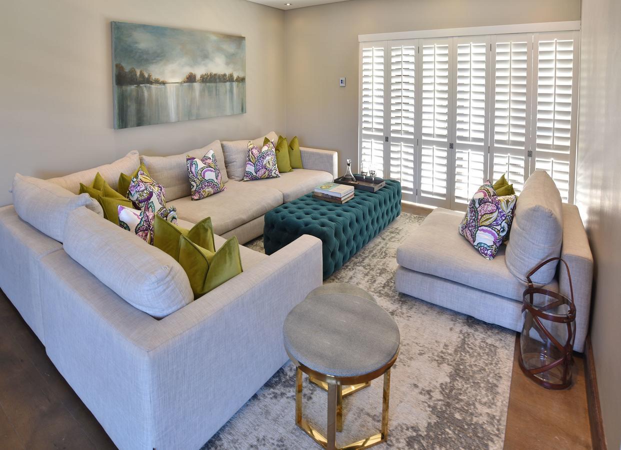 Tredenham Boutique Hotel Bloemfontein Exterior photo A living room with plantation shutters
